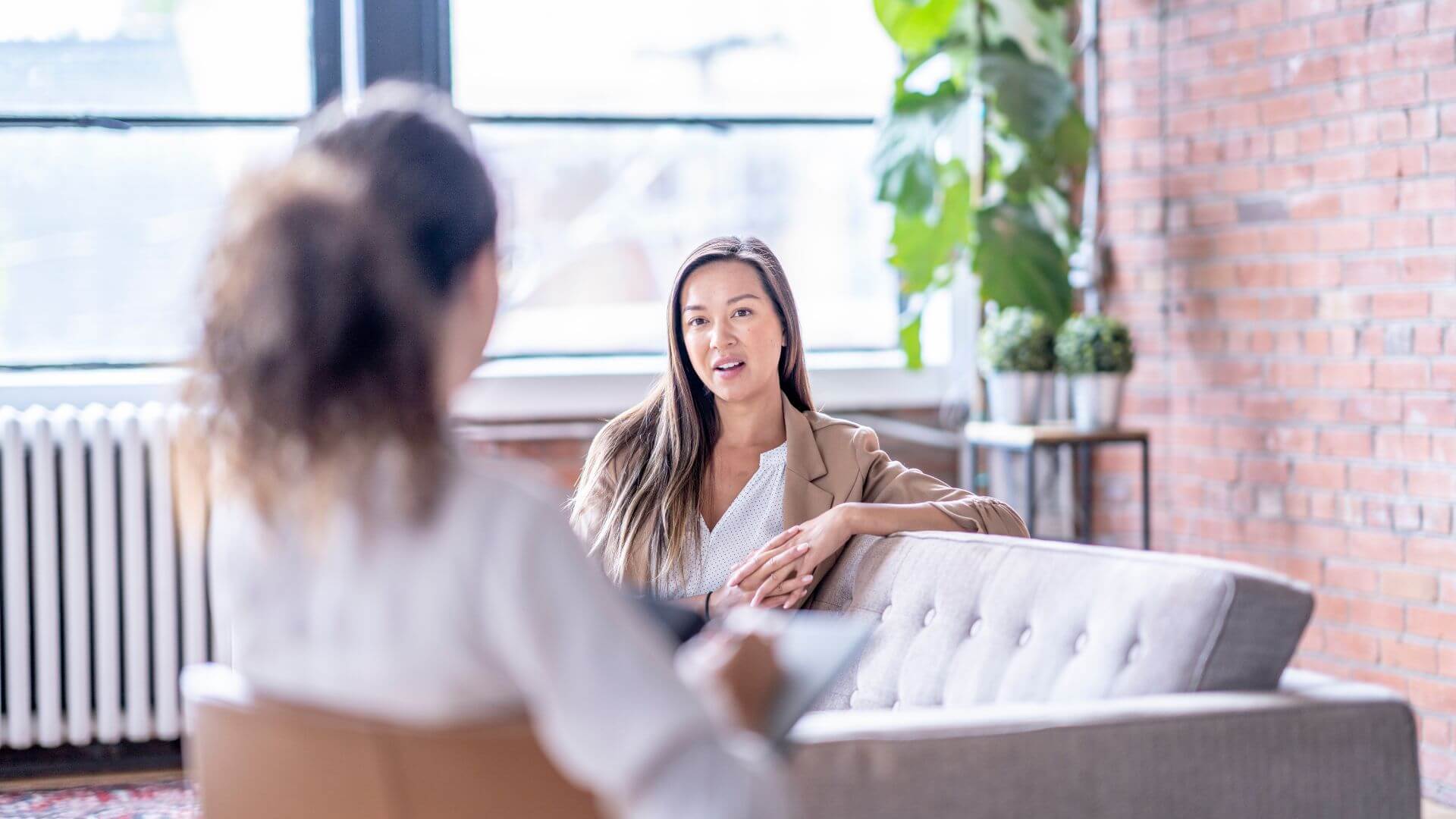 A comfortable, light-filled therapy office.